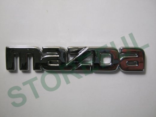 Эмблемма пластик в п/э надпись MAZDA хром 9x1,5 см 01339